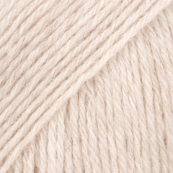 DROPS Fabel Uni 124 white sand