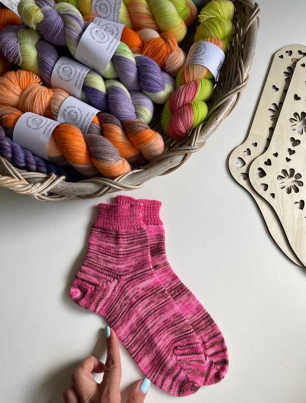 This beautiful pair of socks made by one of our customers on a knitting machine!