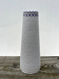 Cone for wool